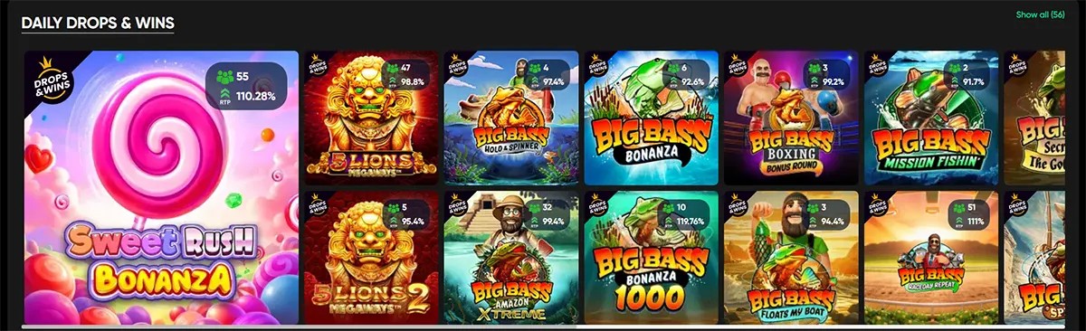 Daily Drops & Wins games grid featuring Sweet Rush Bonanza, 5 Lions Megaways, multiple Big Bass titles, and other colorful slot cards on a dark interface, with RTP and player count badges shown on each game tile.